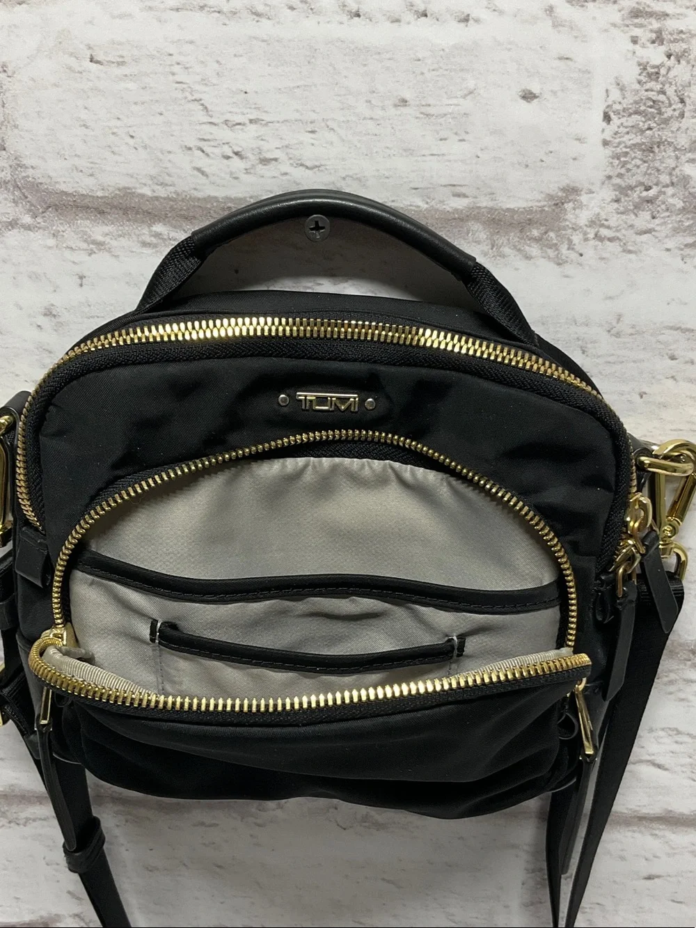 Tumi Black Nylon Crossbody with Gold Hardware Accents